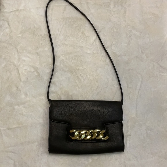 H & M black crossbody with bold gold chain front accent. - Picture 4 of 11